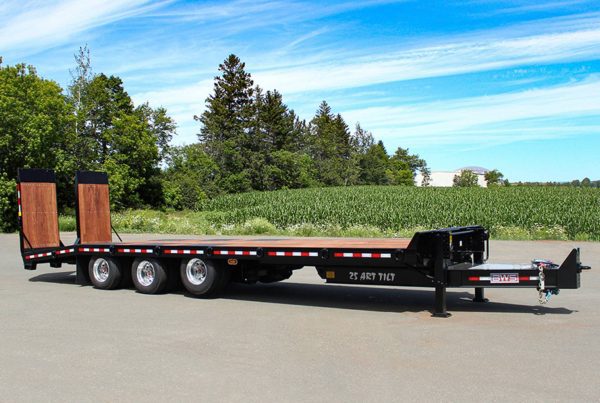 BWS tag along trailer with low deck height for heavy equipment transport