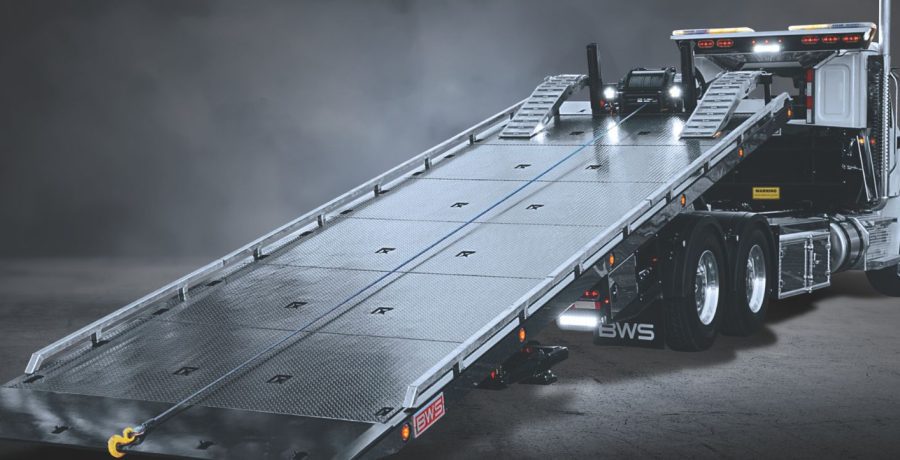 BWS 40 TDP tow deck platform loading heavy equipment with extended steel deck and winch system